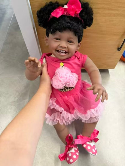 African Reborn Baby Doll - Smiling Pink Cupcake Dress real photo