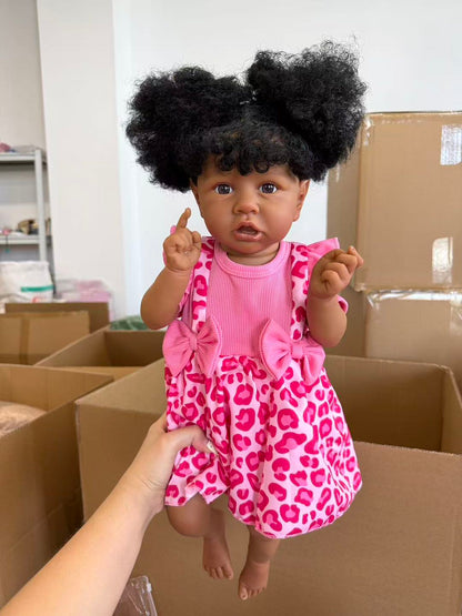 African Reborn Baby Doll - Pink Leopard Romper real photo
