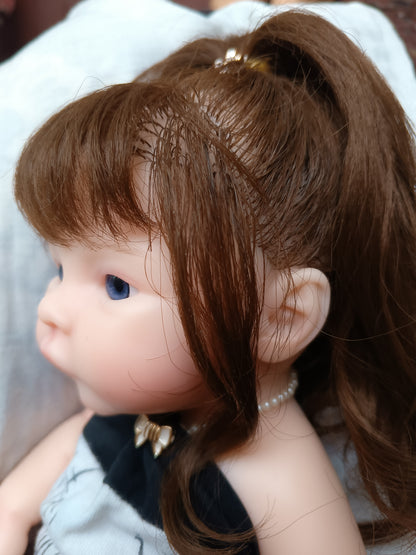 Tiny Darling long hair side profile blue eyes