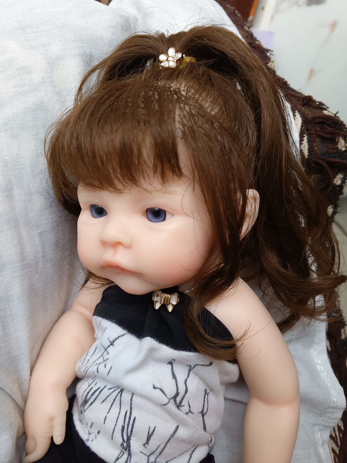 Tiny Darling long brown hair front face close up