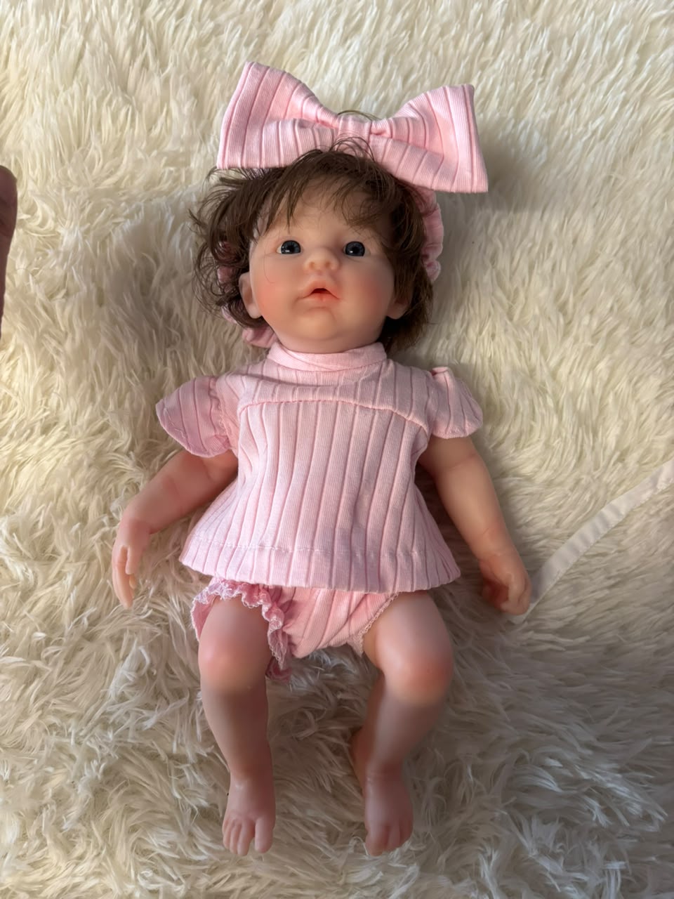 Tiny Darling pink polka dot romper silicone doll