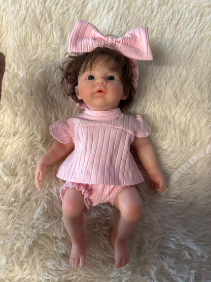 Tiny Darling pink polka dot romper silicone doll
