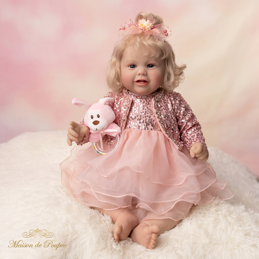 Princess Bloom 26 inch reborn doll soft pink background