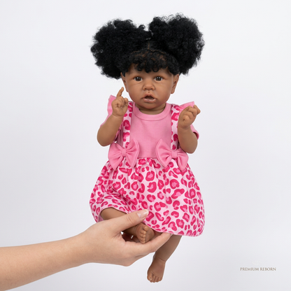 African Reborn Baby Doll - Pink Leopard Romper Afro Puffs