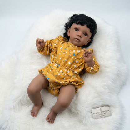 African Reborn Baby Doll - Mustard Yellow Floral Romper